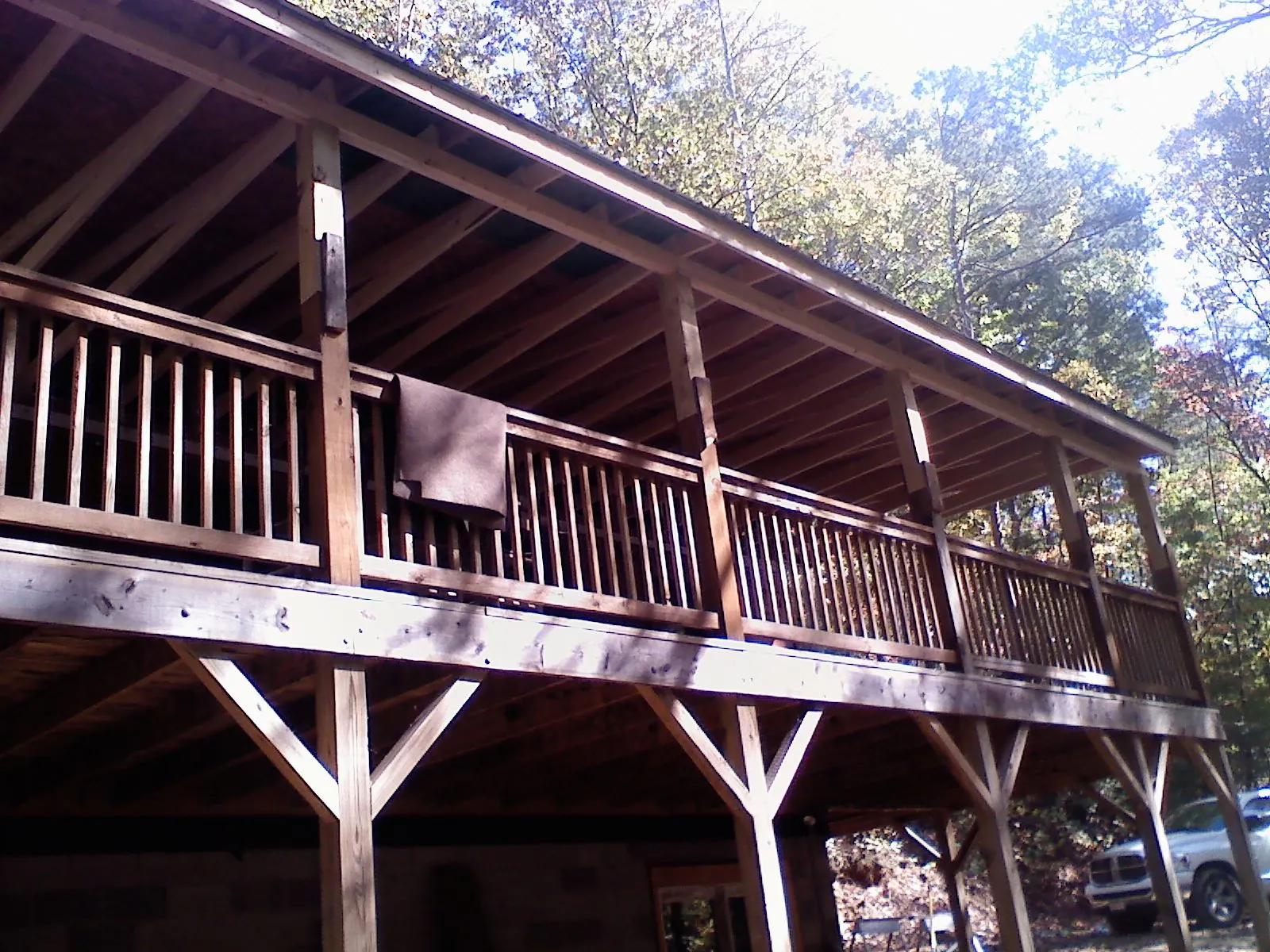 Timber framing under a new elevated porch and deck — Roof Leak Repair in Corinne by Roofing Brothers